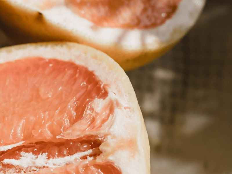 An up close shot of an orange that has been cut in half