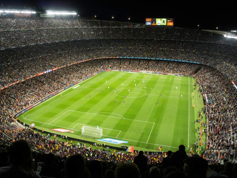 a soccer football stadium filled with people