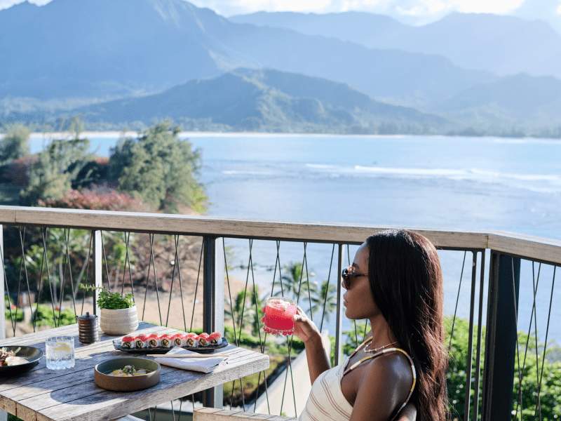 Woman on terrace at 1 Hotel Hanalei Bay