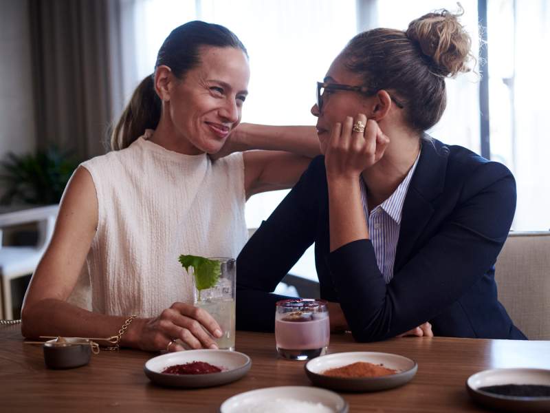 Two people having a cocktail 