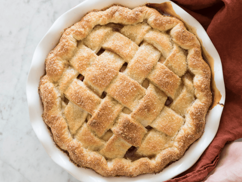 Hands holding a pie