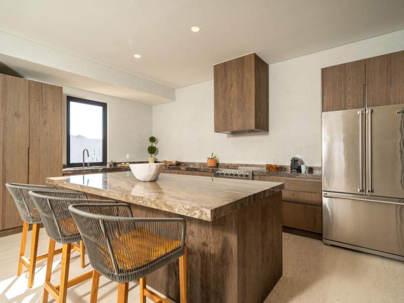Brown themed kitchen with island