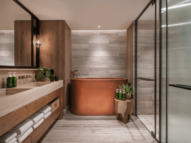 Bathroom with a deep copper tub