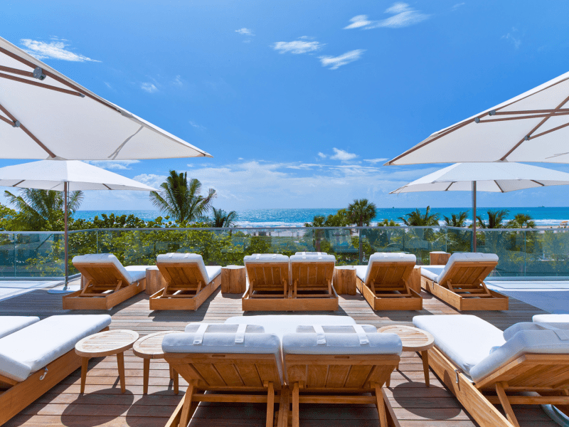 Lounge chairs with umbrellas