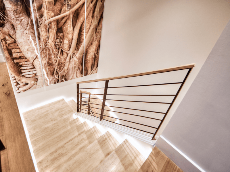 A staircase with exposed wood