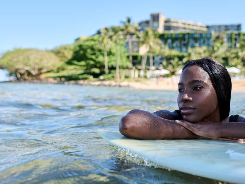 Woman in the ocean in Kauai