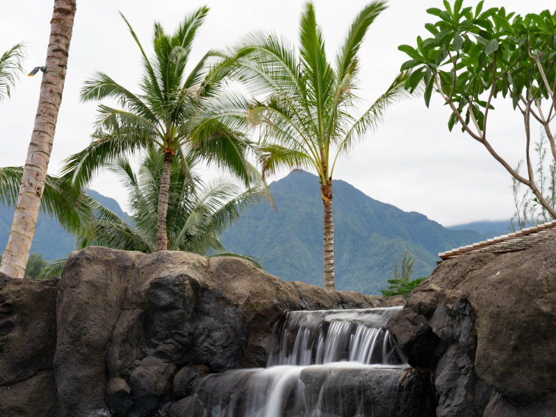 Man made waterfall flowing into a pool
