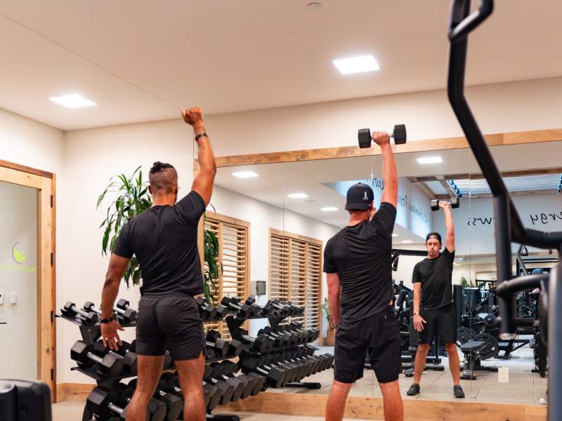 two people working out in a gym