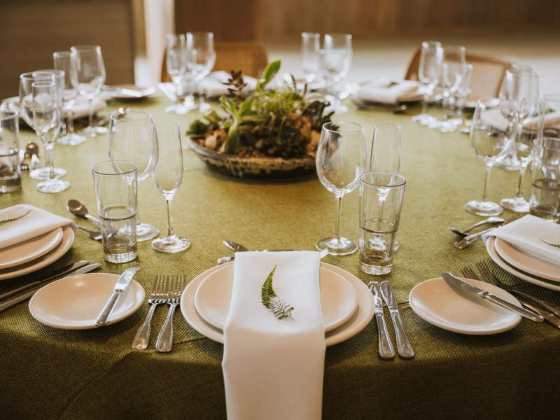 Table Settings with a olive green colour tablecloth