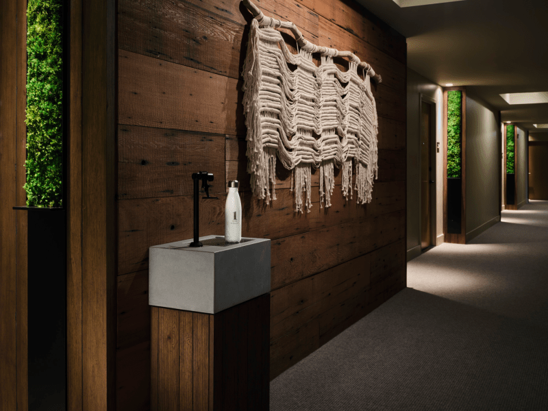 Dark hallway with a water fountain