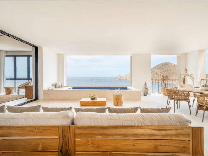 Bright seating area with an indoor pool