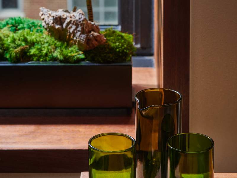 Recycled glasses by the window