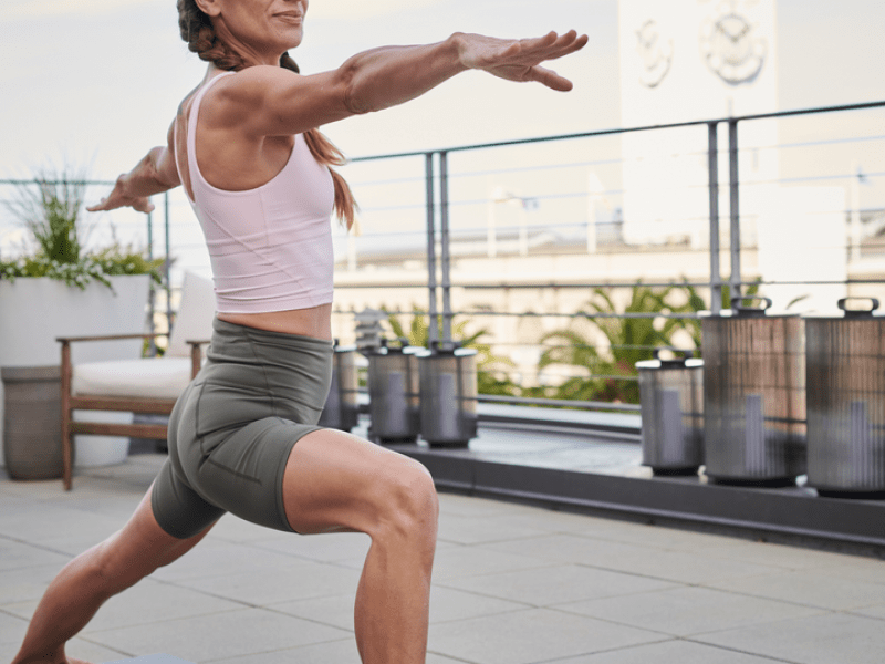 Person doing yoga on the rooftop