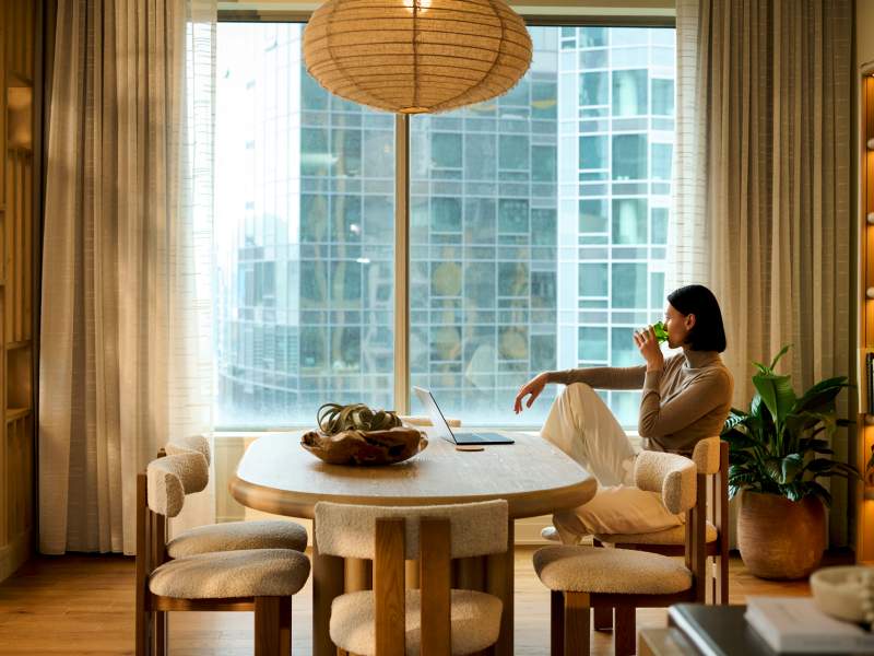 Female looking out of window