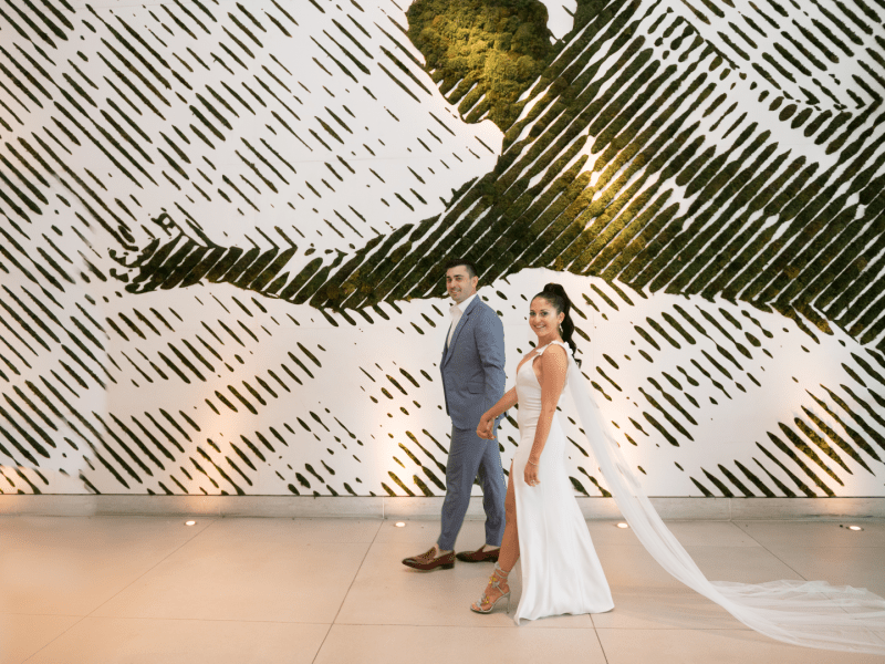 A couple walking together holding hands