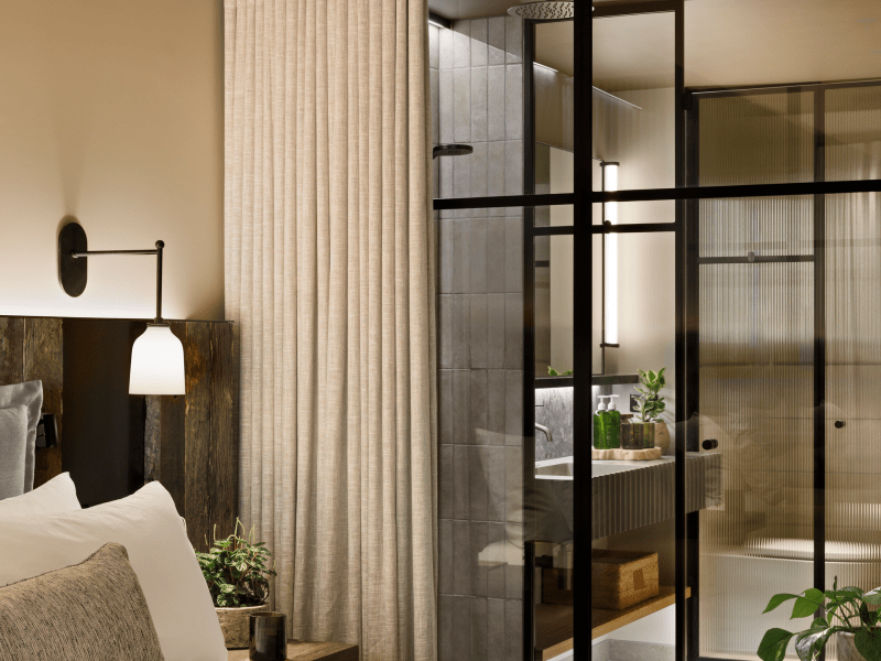 Bedroom with view of bathroom