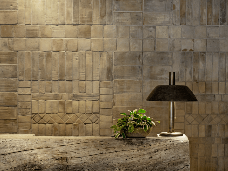 Reception desk with a beautiful stonewall backdrop