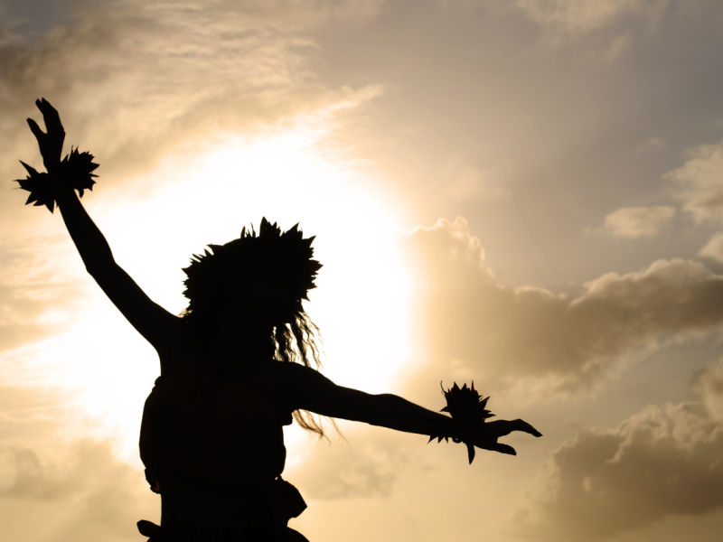 A silhouette of a person dancing