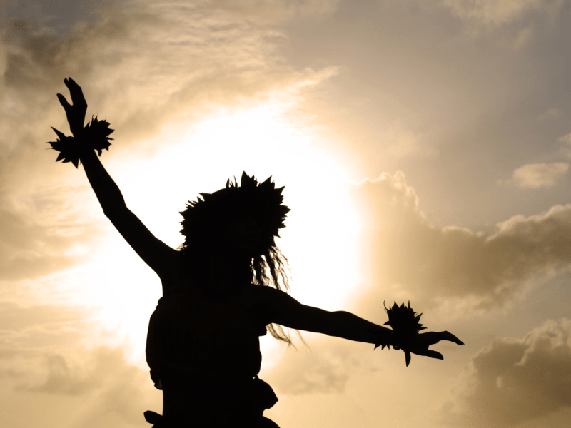 A silhouette of a person dancing