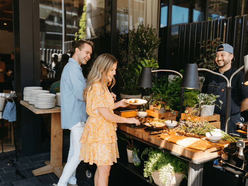 A couple peruse the Easter brunch buffet together