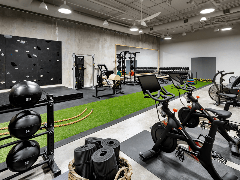 A fitness center with machines and free weights