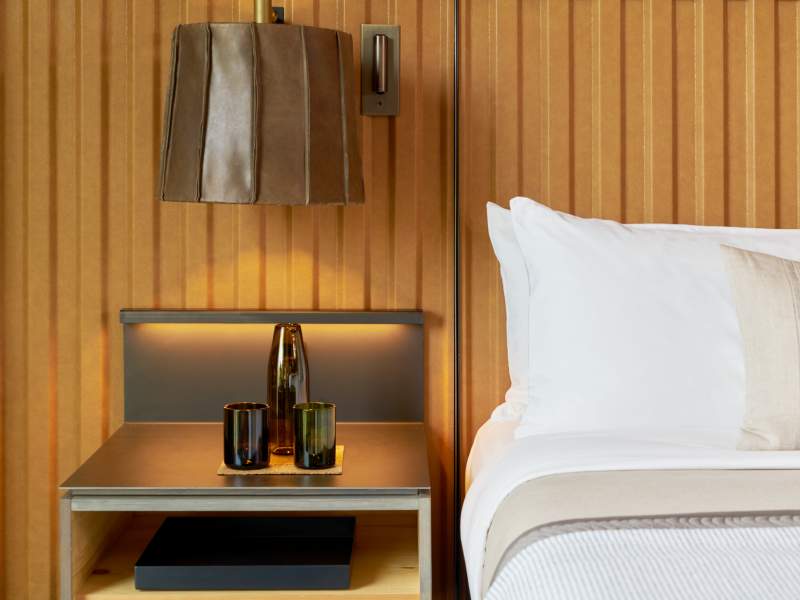 details of bed in bridge king guestroom