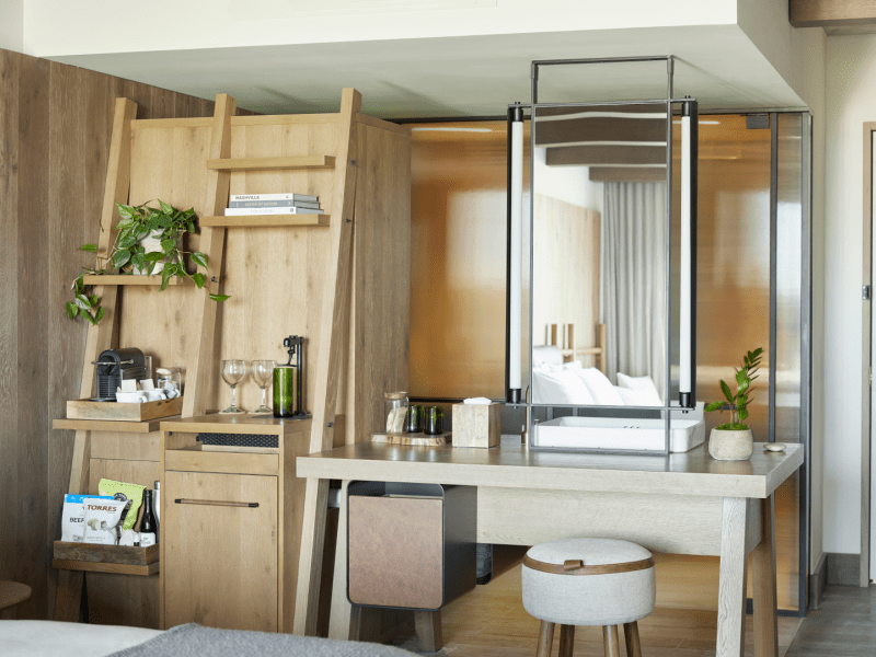 Wood paneled bedroom with makeup vanity table