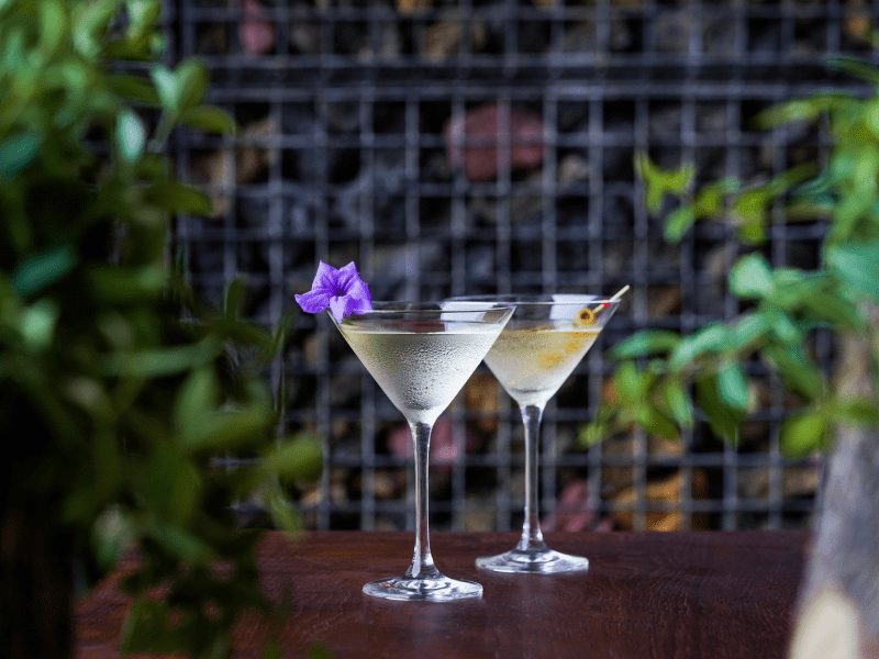 Two cocktails on a table