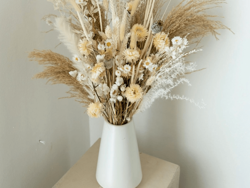 dried flower arrangement in a vase 
