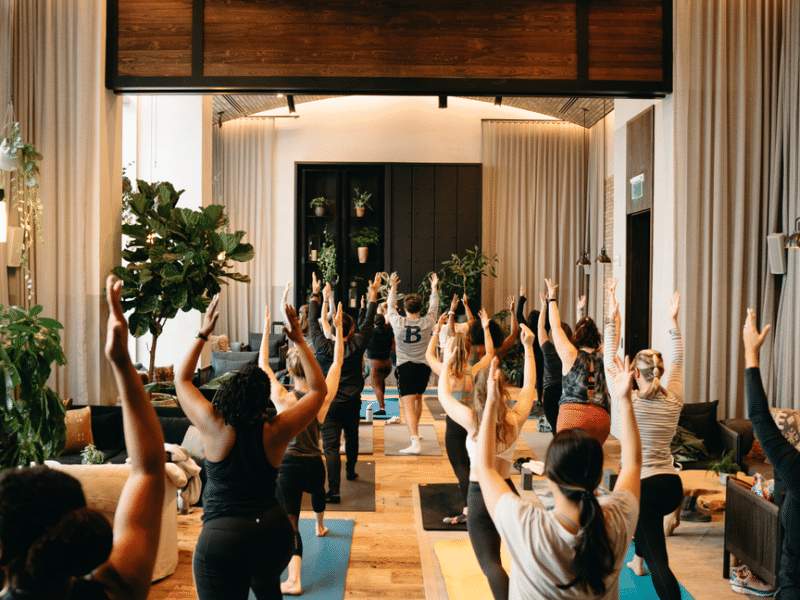 group of people doing yoga