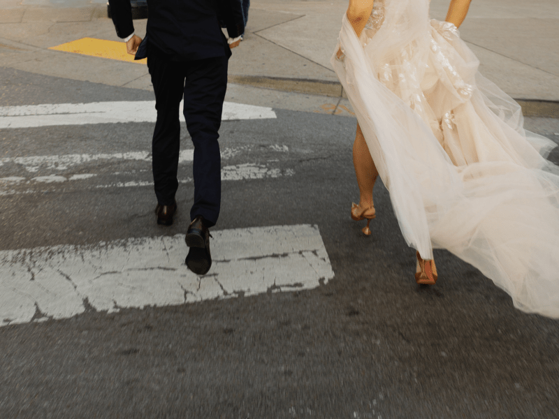 Bride and groom on cross walk