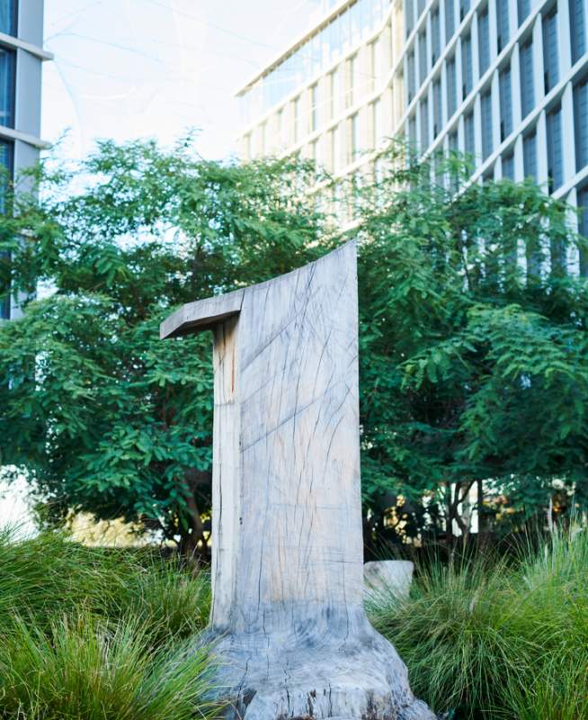 Wooden 1 Hotel logo statue