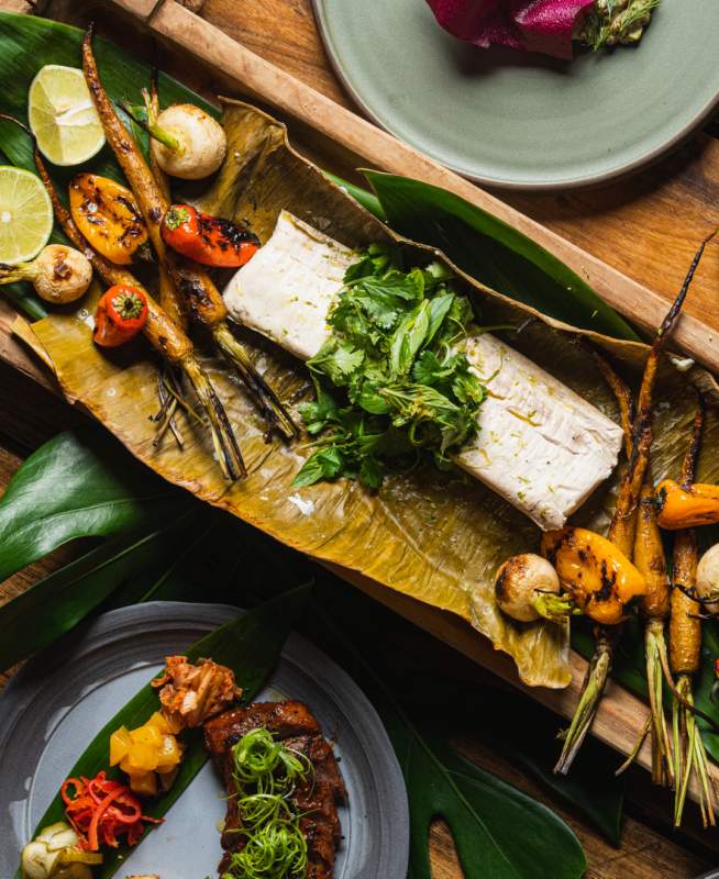 Charred vegetables on a board