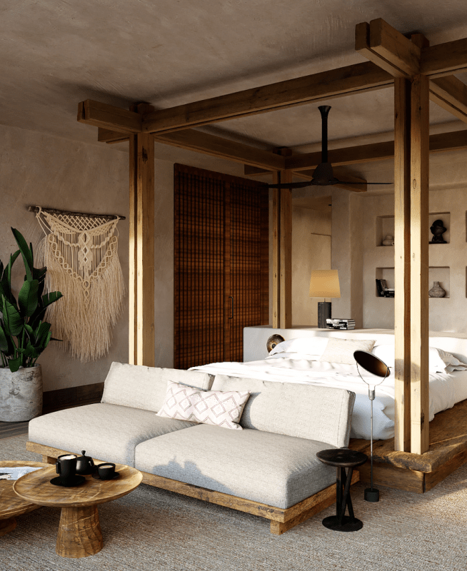 Royal suite bedroom with a large king size bed underneath a canopy 