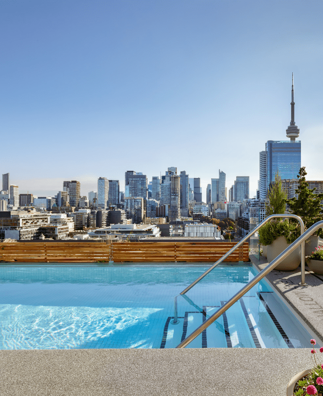 Rooftop pool with the Toronto skyline in the background 