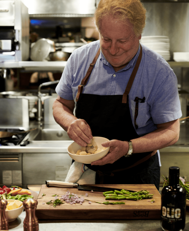 Chef Jonathan Waxman preparing food 