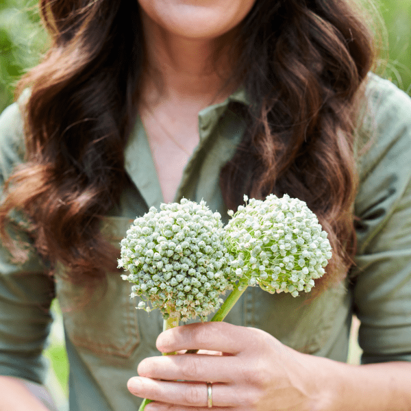 Woman holding plants