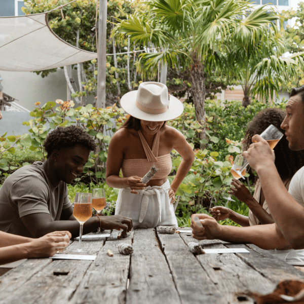 Group of people sipping wine