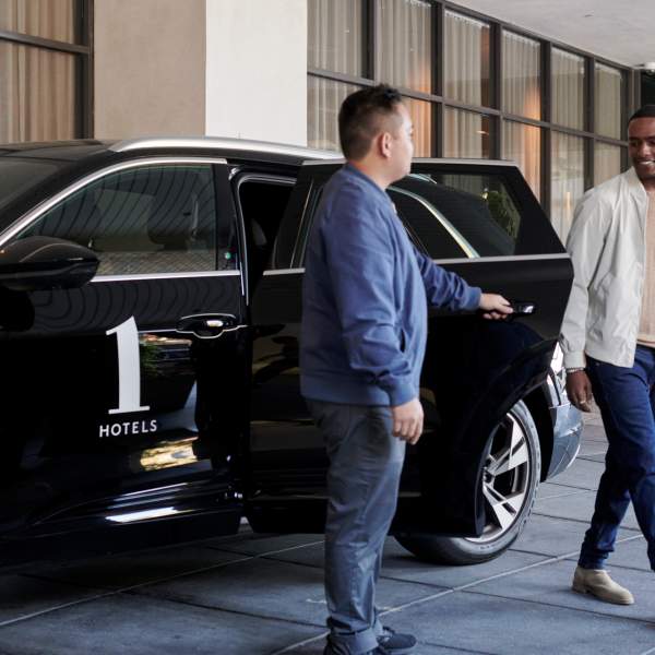 A valet welcomes guest 