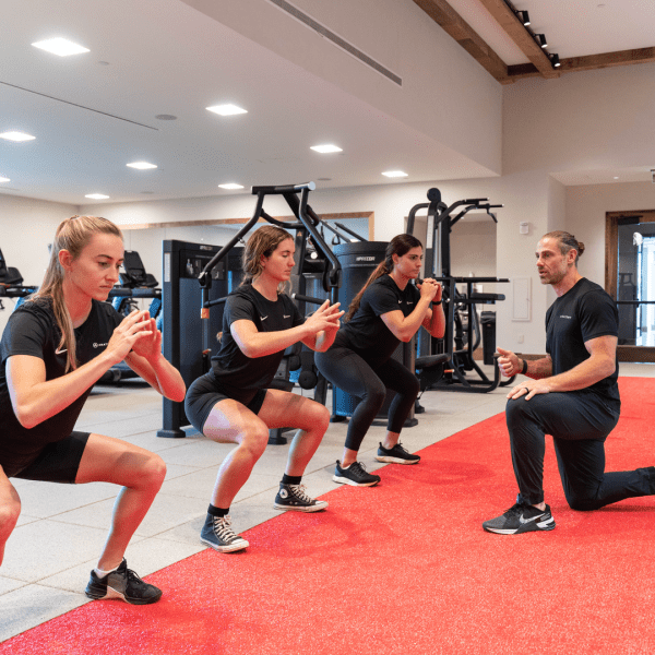 people doing squats