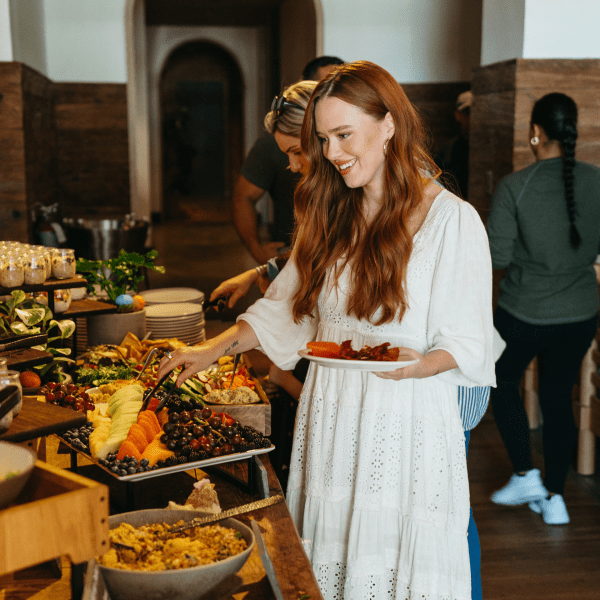 woman eating from a buffet
