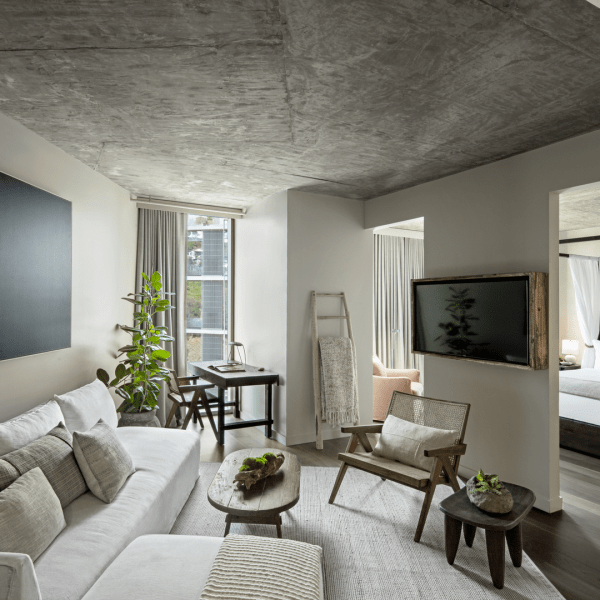 A living room area with a couch and bench