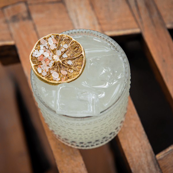 hand holding a cocktail