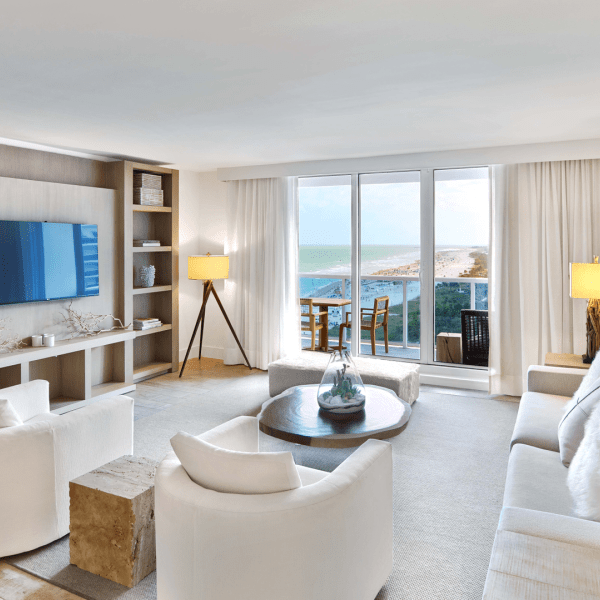 A living room area with couches and chairs