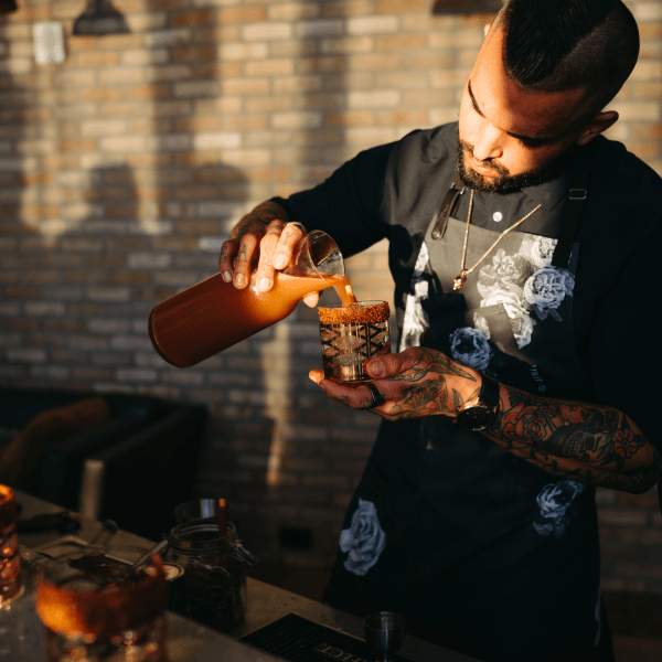 bartender pouring drink