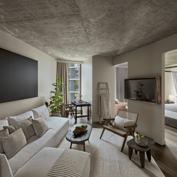 A living room area with a couch and chair