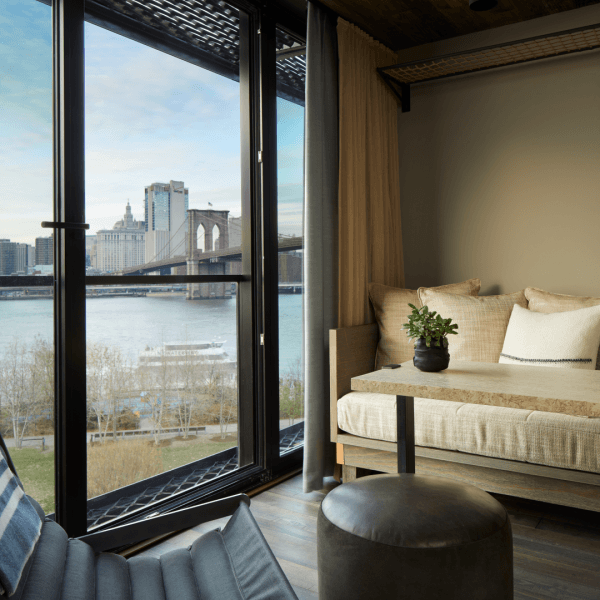 Couch overlooking the hudson river in hotel room