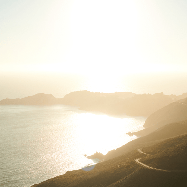 Landscape panoramic of the beach in the sunset with hills