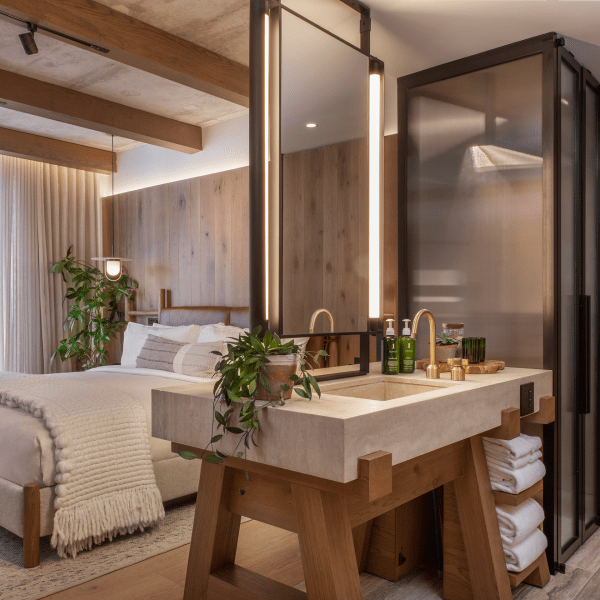 hotel room with bed and bathroom