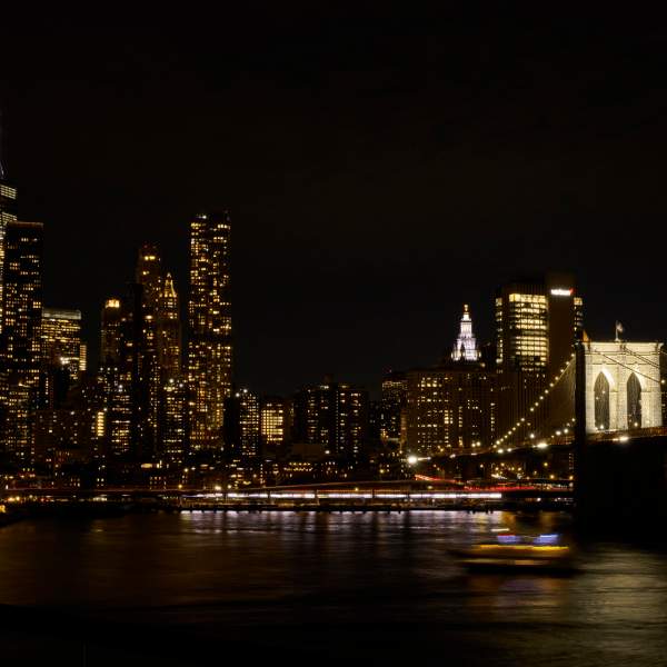 view of nyc skyline and brooklyn bridge from harriet's rooftop